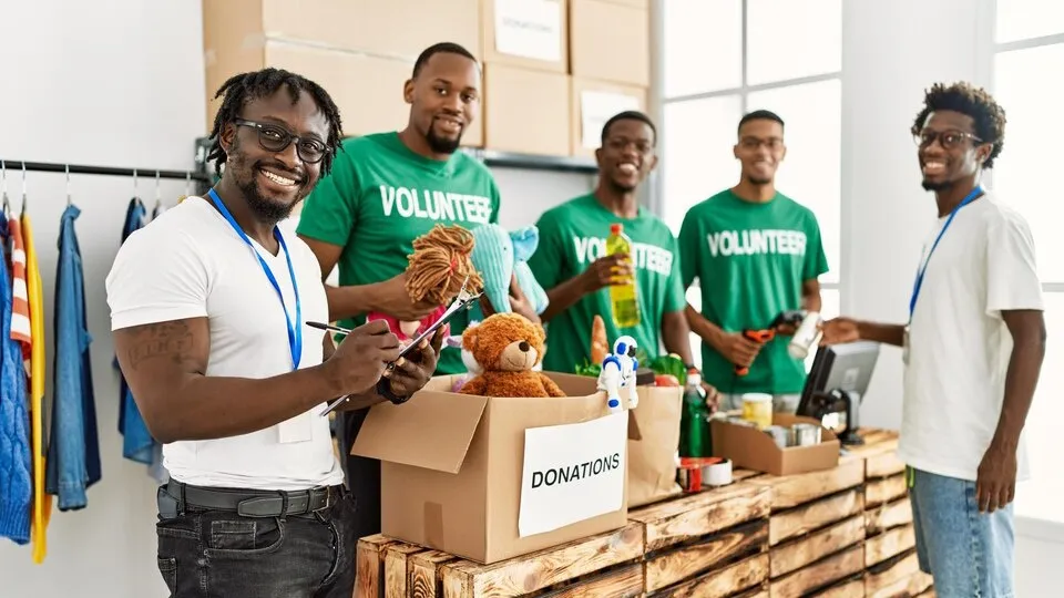 african volunteers working in a charity center